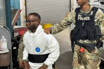 Sgt. Quornelius Radford, a suspect in the shooting of five soldiers at Fort Stewart, is escorte ...