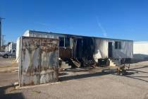Crews battle a mobile home fire Thursday, Aug. 7, 2025, on the 3900 block of North Las Vegas Bo ...