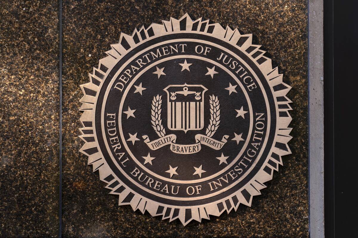 FILE - The seal of The Federal Bureau of Investigation is seen on the Headquarters in Washingto ...