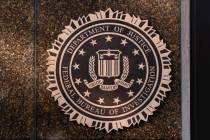 FILE - The seal of The Federal Bureau of Investigation is seen on the Headquarters in Washingto ...