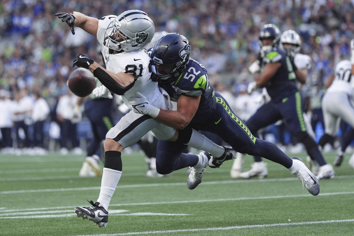 Seattle Seahawks linebacker Patrick O'Connell (52) forces an incomplete on Las Vegas Raiders wi ...