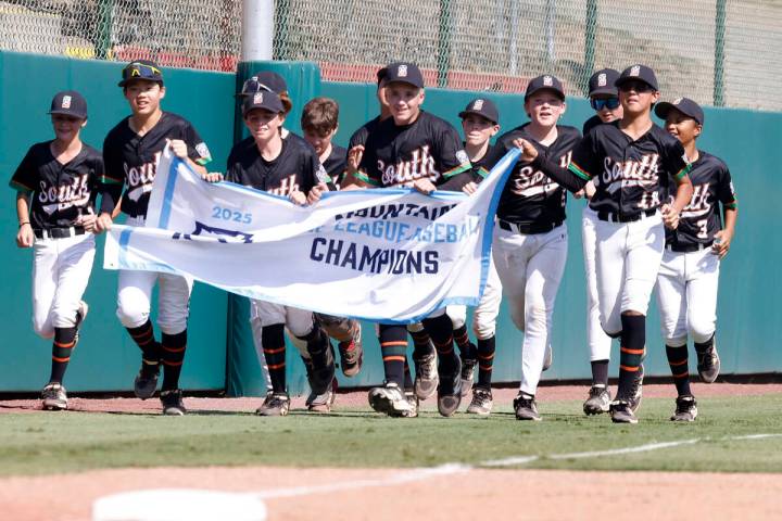 Nevada players celebrate their 6-3 win against Utah during the Mountain Regional final baseball ...