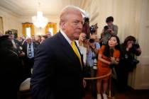 President Donald Trump departs an event to mark National Purple Heart Day in the East Room of t ...