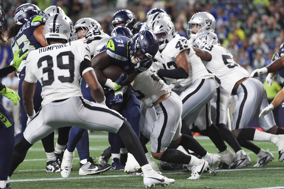 Seattle Seahawks running back Jacardia Wright (31) runs for a touchdown during the second half ...
