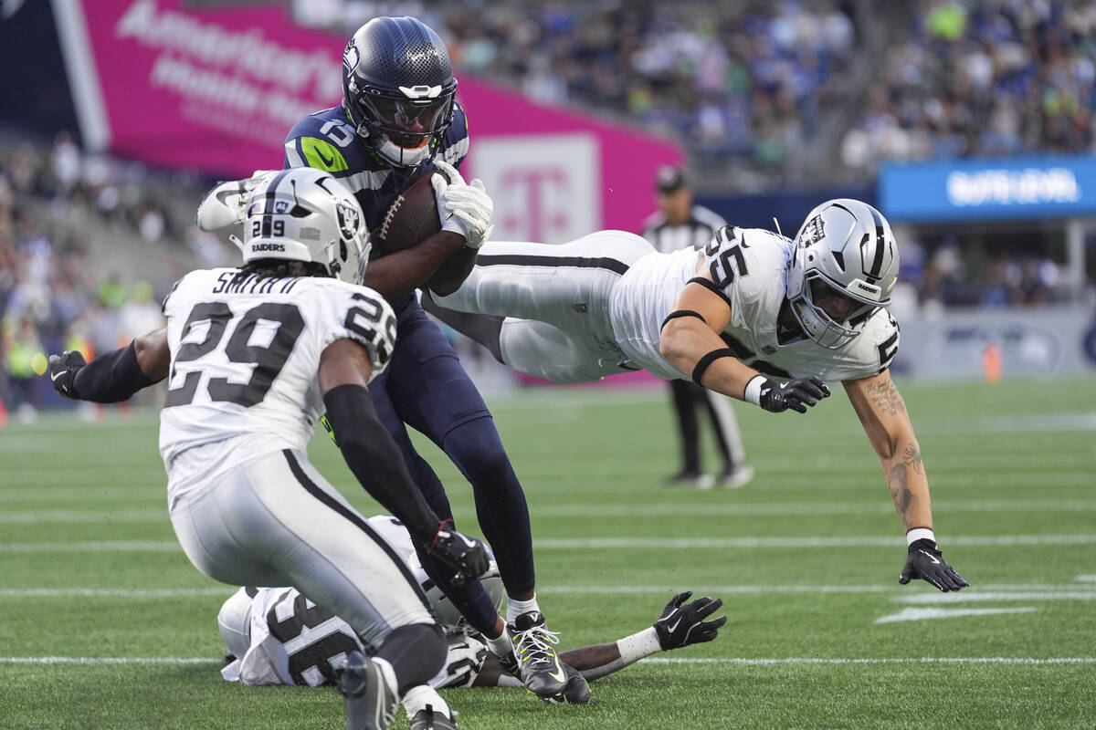 Seattle Seahawks wide receiver Tory Horton (15) goes to score against Las Vegas Raiders safety ...