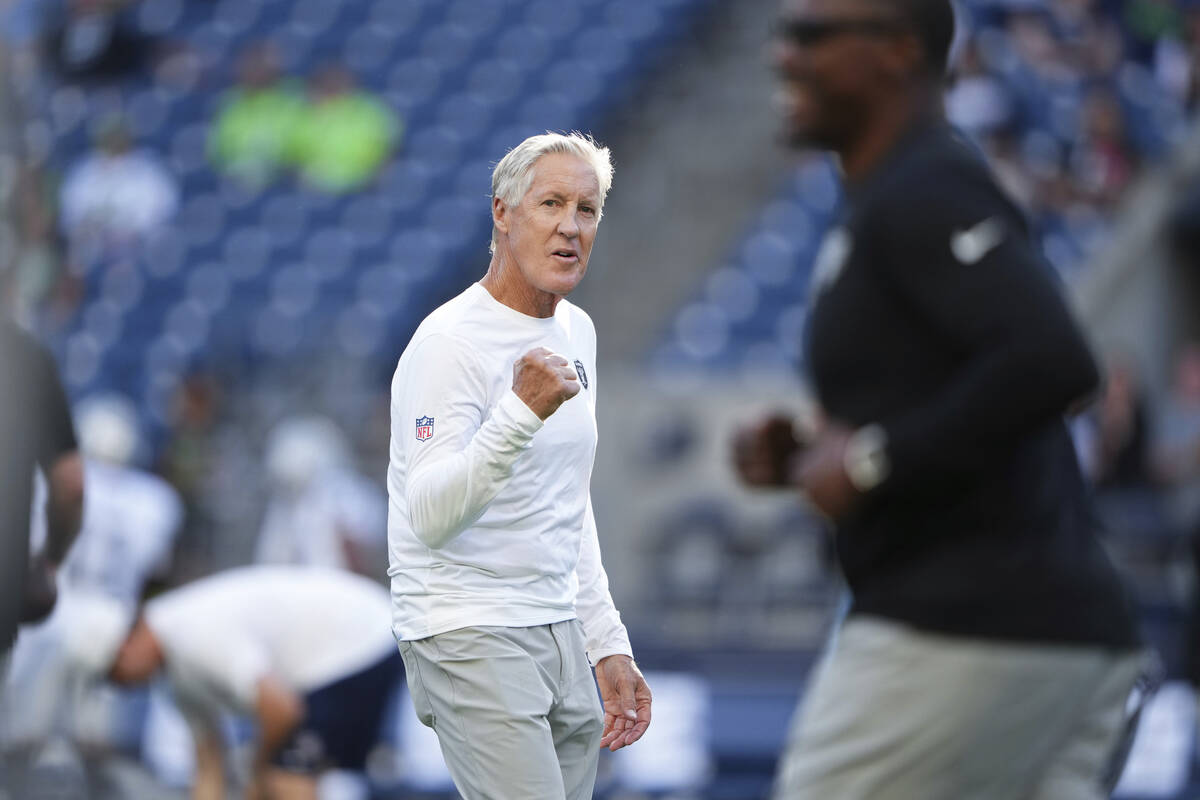 Las Vegas Raiders head coach Pete Carroll reacts during warm ups before an NFL preseason footba ...