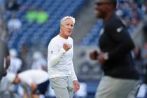 Las Vegas Raiders head coach Pete Carroll reacts during warm ups before an NFL preseason footba ...