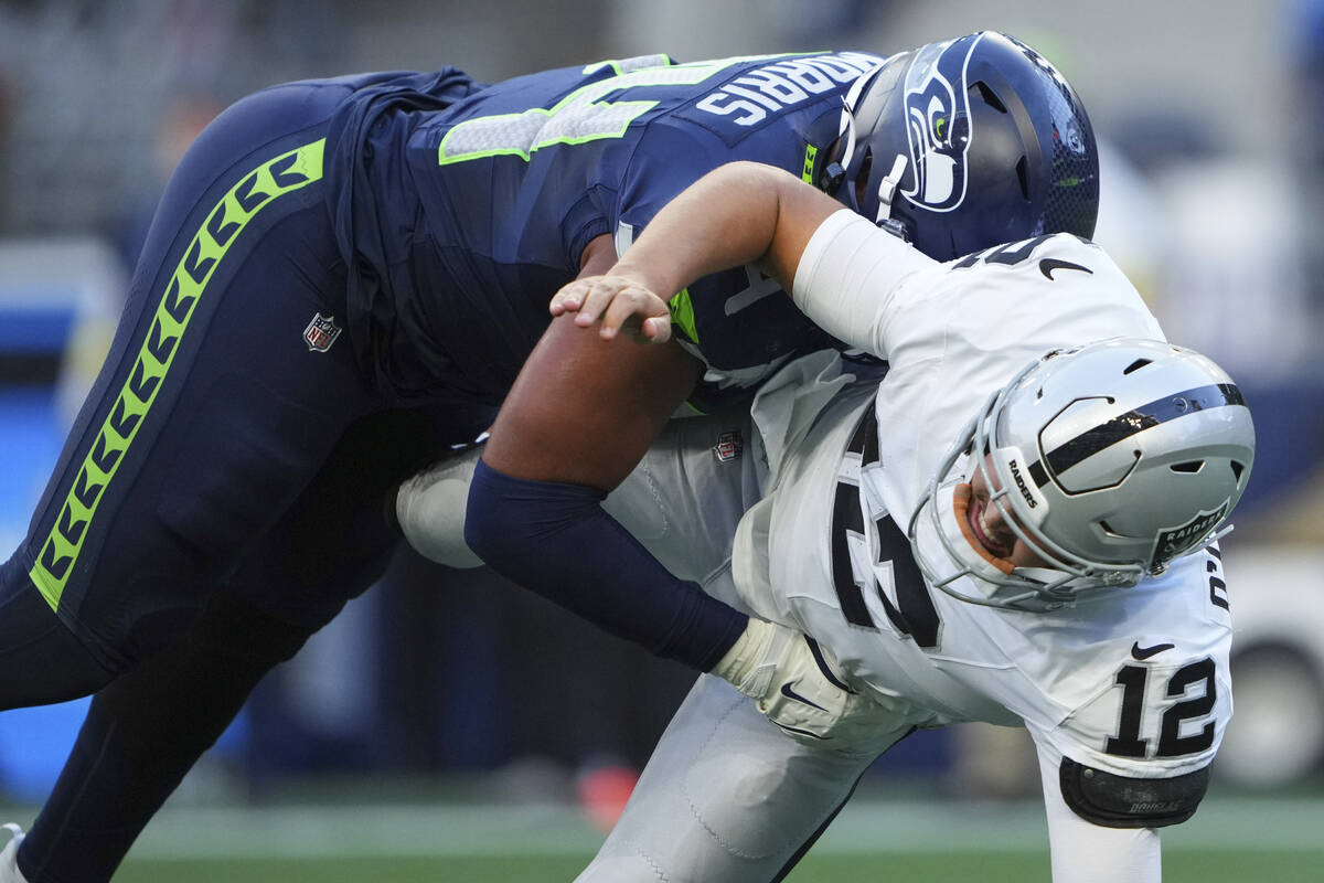 Seattle Seahawks cornerback Shaquill Griffin (24) forces an incomplete as he tackles Las Vegas ...