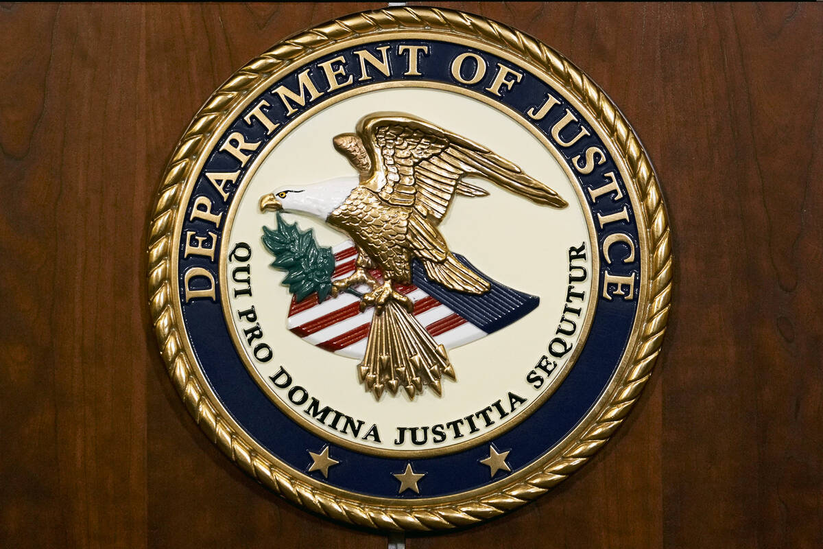 FILE - The seal of the Department of Justice is shown in Washington, Aug. 1, 2023. (AP Photo/J. ...