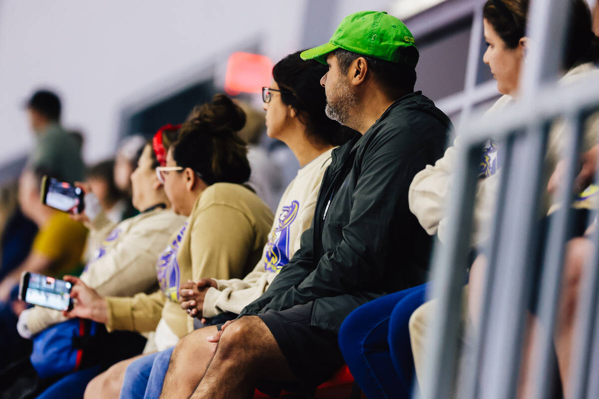 People watch from the stands during a Golden Knights high school hockey league game at America ...
