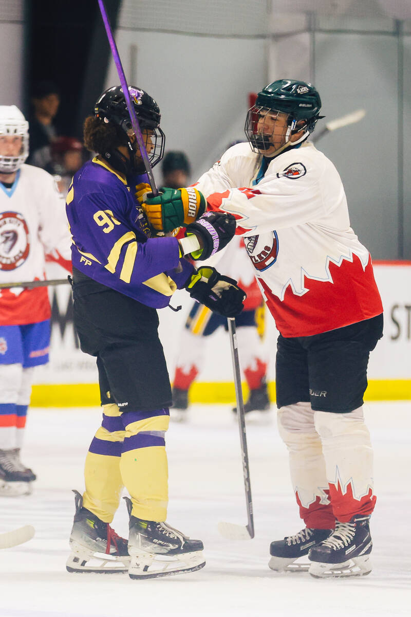 A fight ensues during a Golden Knights high school hockey league game at America First Center T ...