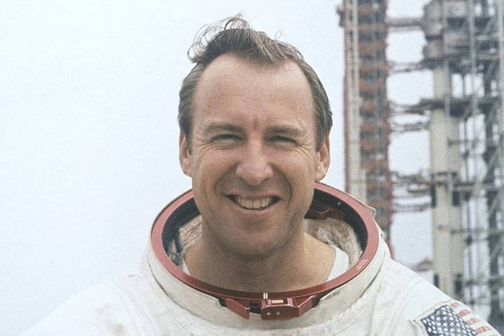 In this photo provided by NASA, astronaut James Lovell, Apollo 13 Commander, is shown in his sp ...