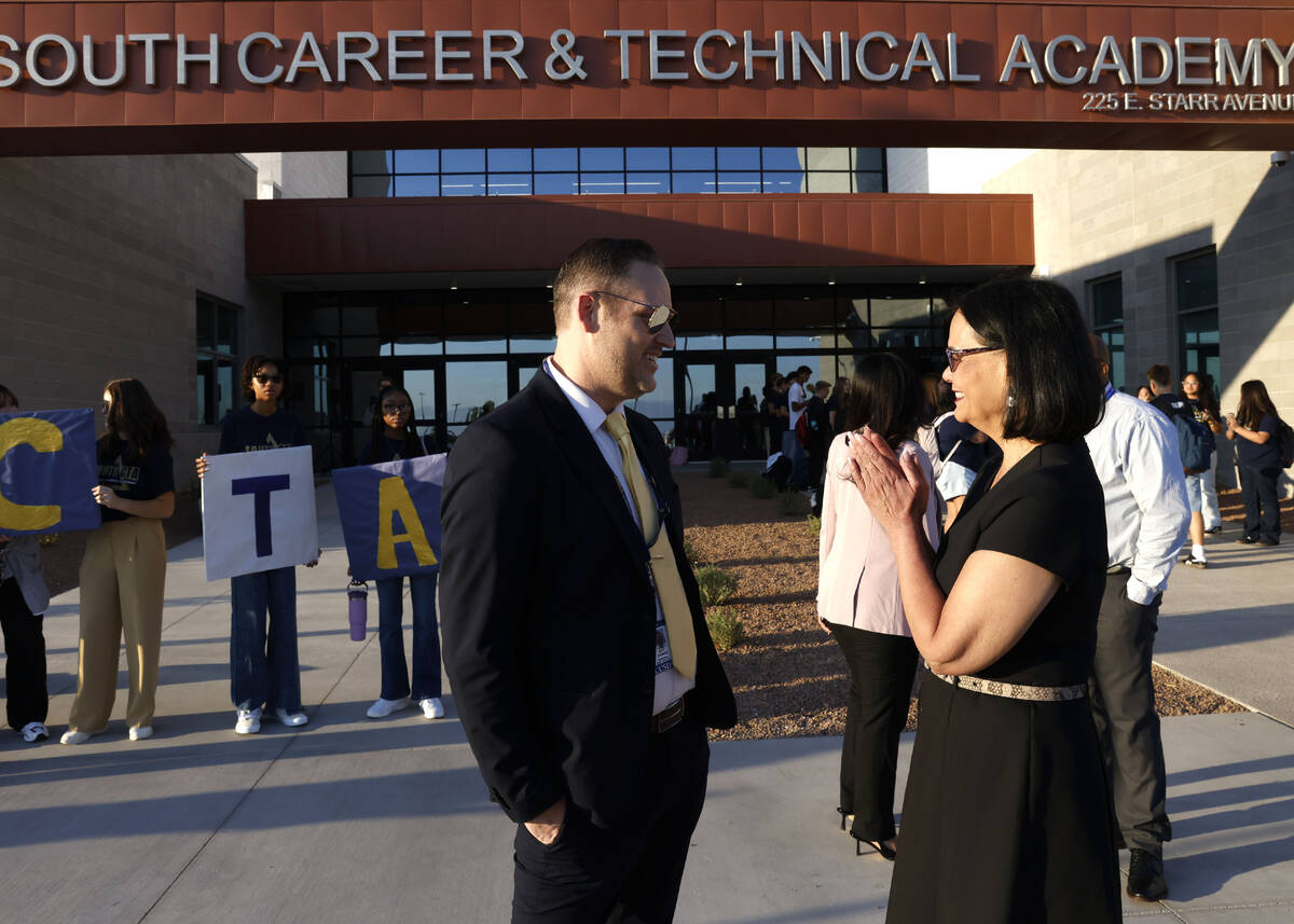 Clark County School District Superintendent Jhone Ebert, right, is greeted by South Career and ...