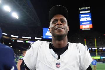 Las Vegas Raiders quarterback Geno Smith (7) leaves the field after an NFL preseason football g ...