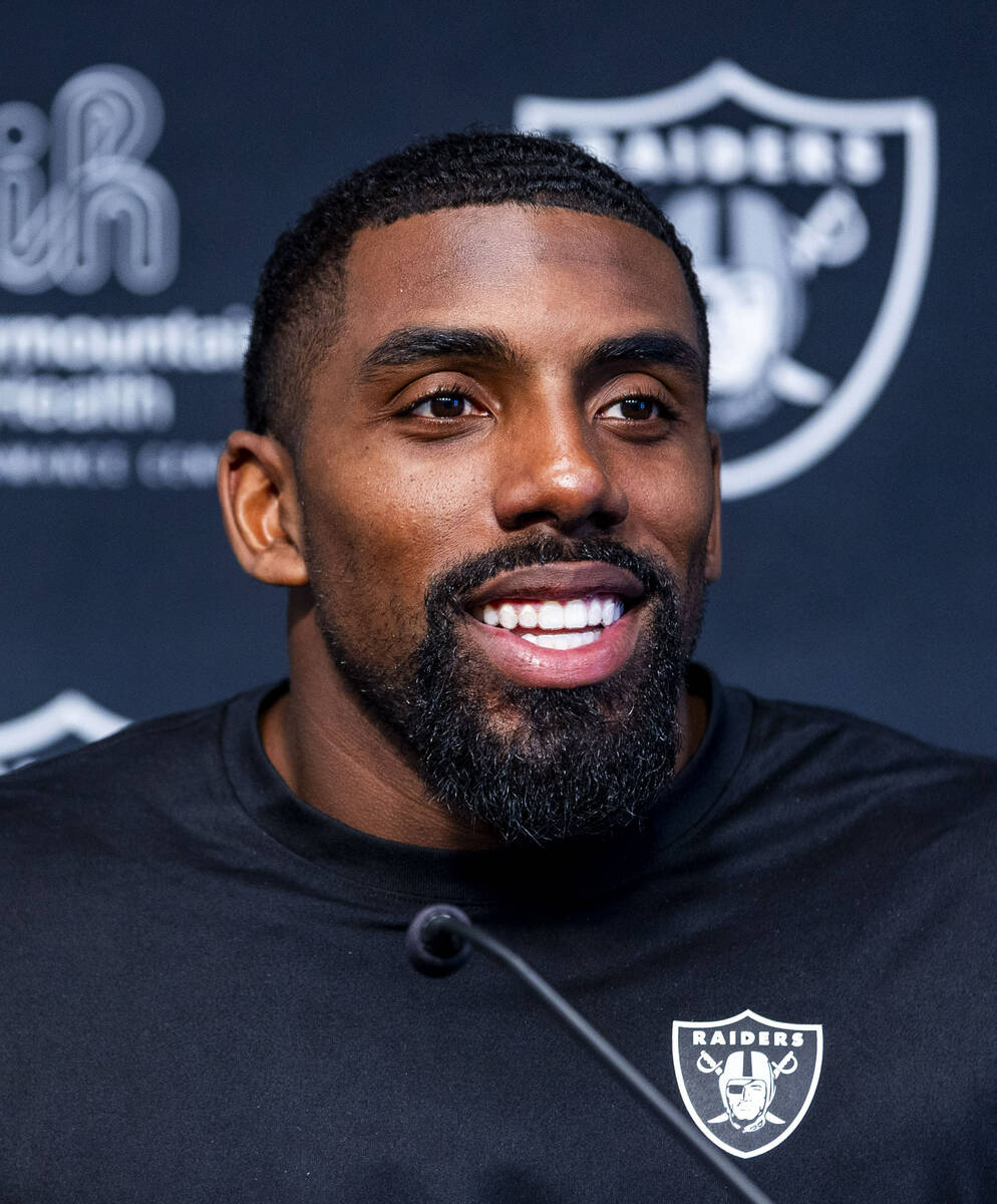 Raiders defensive tackle Thomas Booker IV (47) speaks during an interview at training camp in t ...