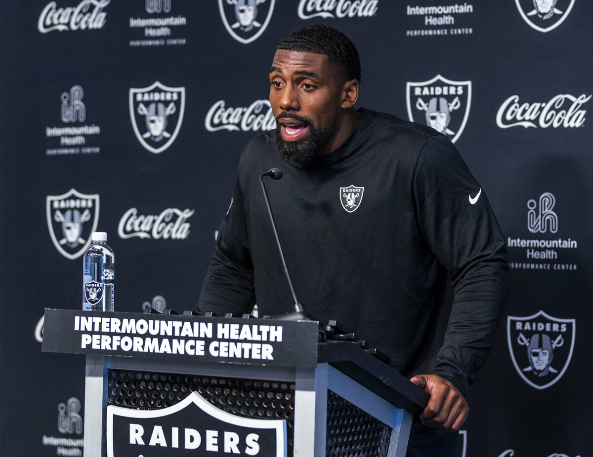 Raiders defensive tackle Thomas Booker IV (47) speaks during an interview at training camp in t ...