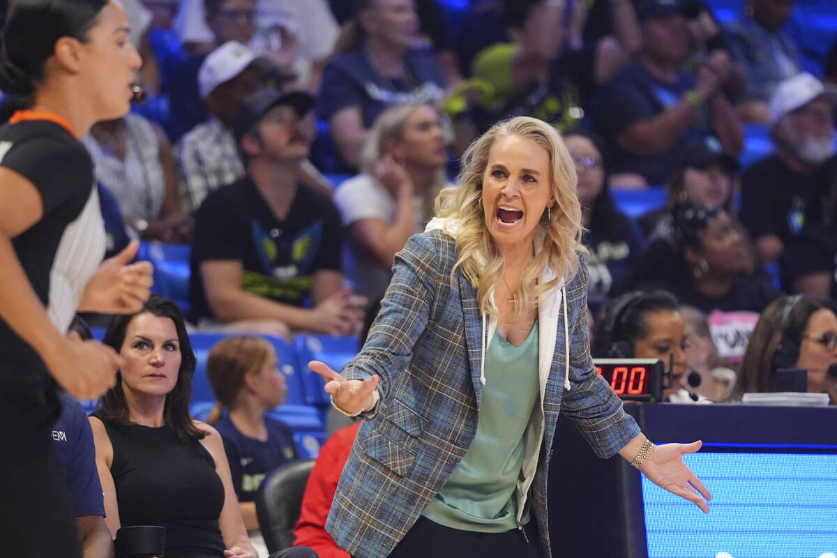 Las Vegas Aces head coach Becky Hammon questions a call during the first half of a WNBA basketb ...
