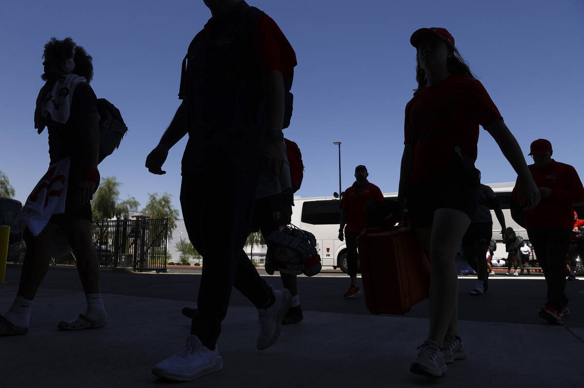UNLV football players arrive for practice at the Raiders headquarters and practice facility, In ...