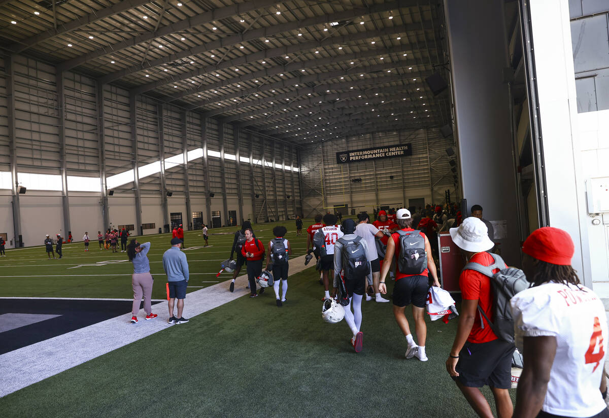 UNLV football players arrive for practice at the Raiders headquarters and practice facility, In ...