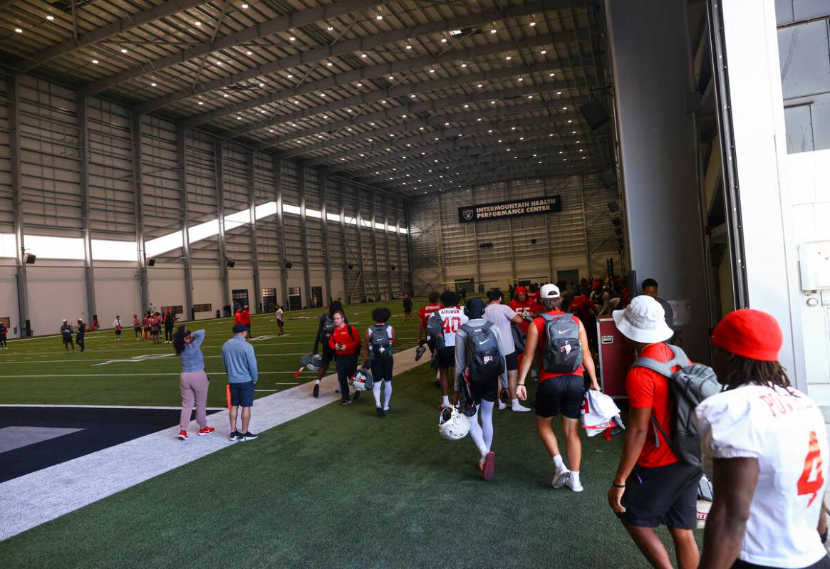 UNLV football players arrive for practice at the Raiders headquarters and practice facility, In ...