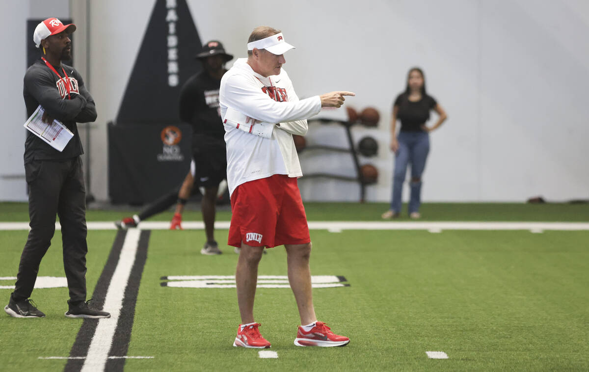 UNLV head coach Dan Mullen leads the team’s football practice at the Raiders headquarter ...