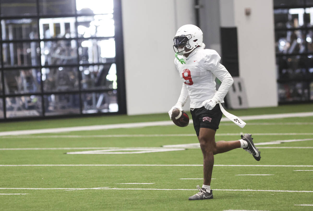 UNLV running back Jai'Den Thomas (9) holds the ball during football practice at the Raiders hea ...