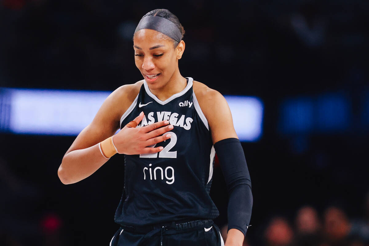 Aces center A'ja Wilson (22) walks down the court during a WNBA basketball game between the Ace ...