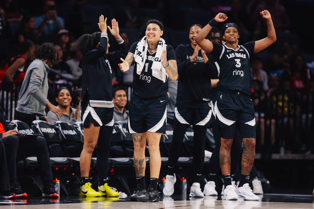 The Aces bench cheers during a WNBA basketball game between the Aces and Connecticut Sun at Mic ...