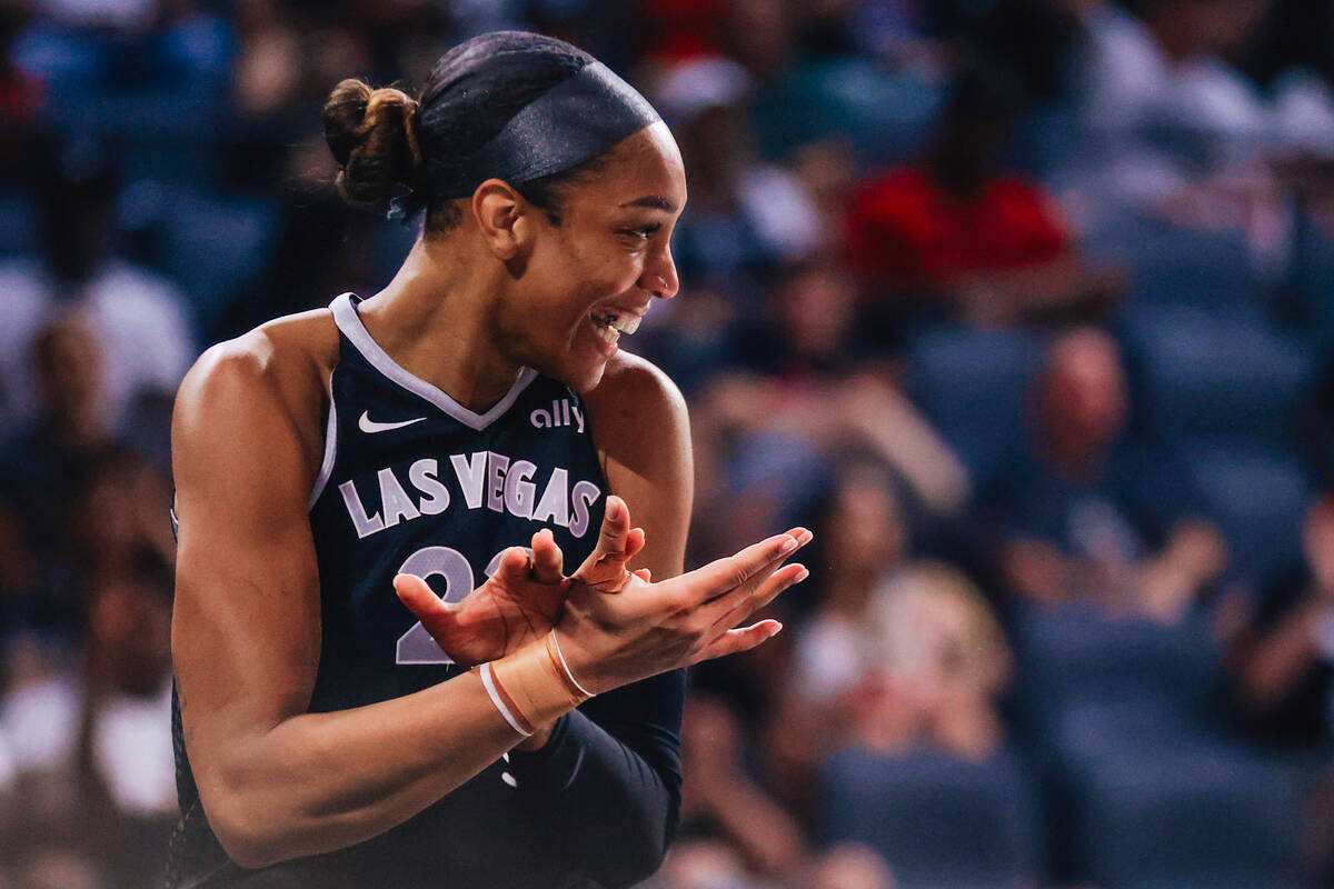 Aces center A'ja Wilson celebrates drawing foul during a WNBA basketball game between the Aces ...
