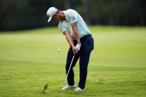 Collin Morikawa hits to the second green during the second round of the St. Jude Championship g ...