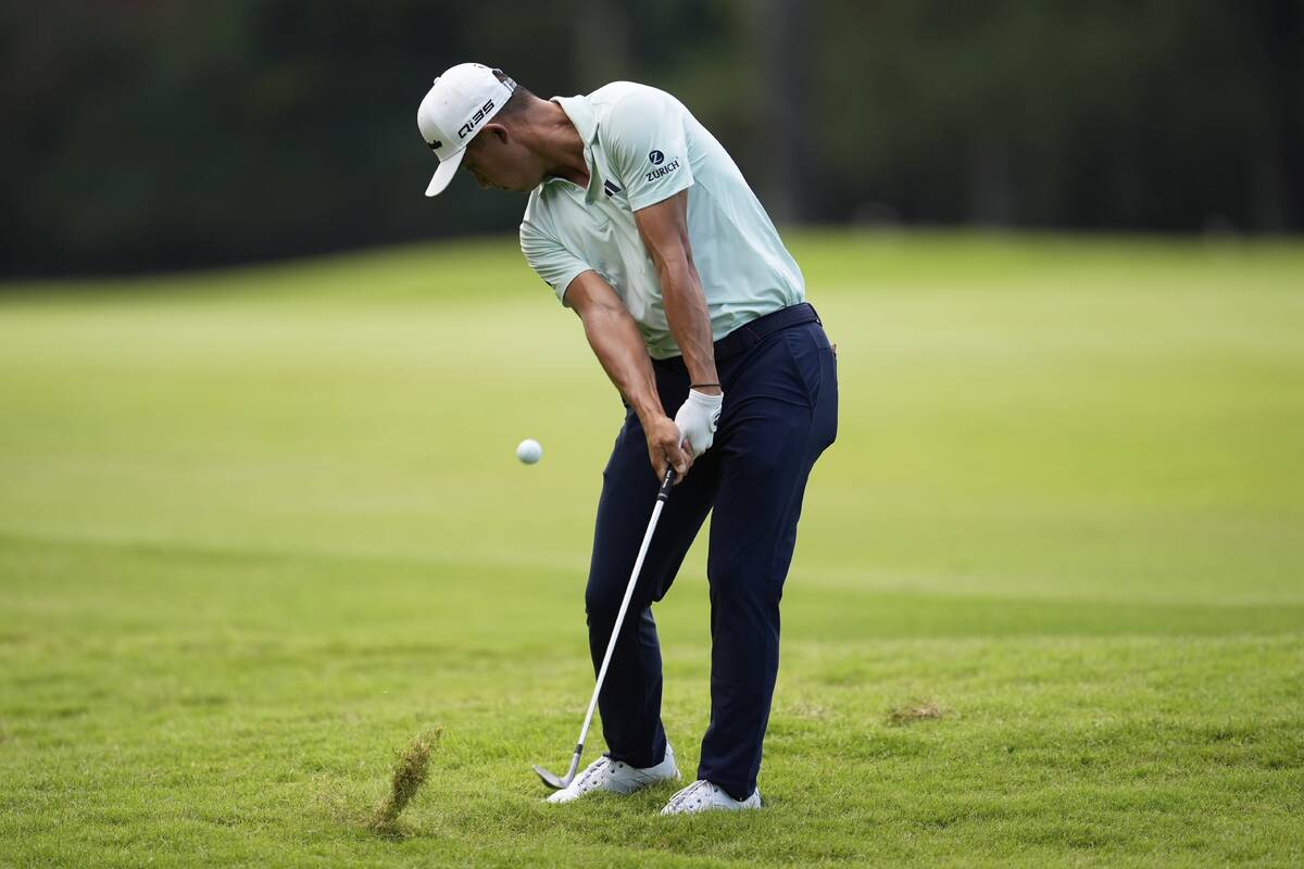 Collin Morikawa hits to the second green during the second round of the St. Jude Championship g ...