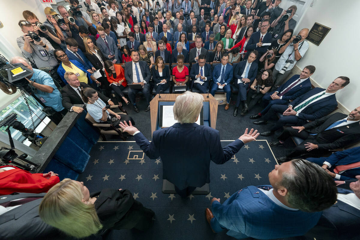President Donald Trump speaks with reporters in the James Brady Press Briefing Room at the Whit ...
