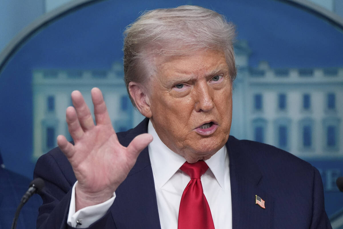 President Donald Trump speaks with reporters in the James Brady Press Briefing Room at the Whit ...
