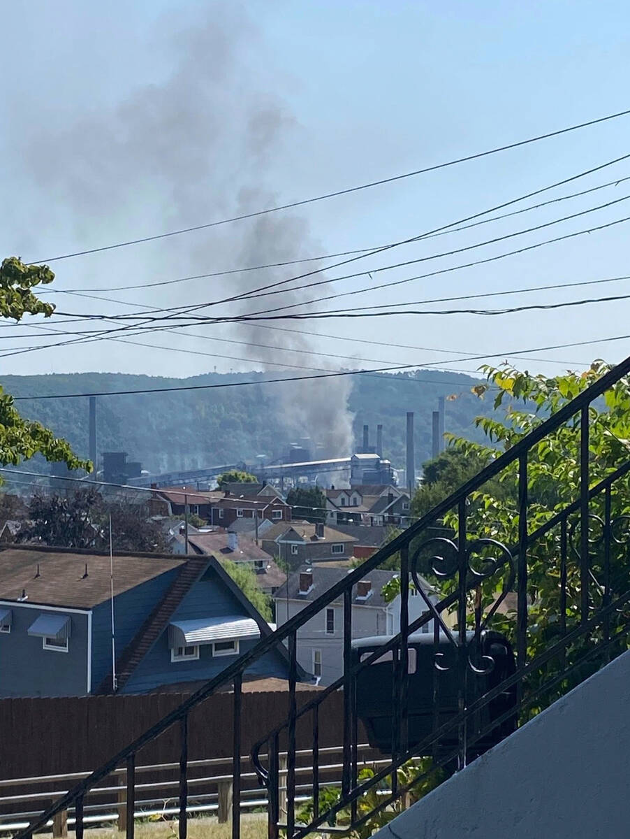 This image provided by Amy Sowers shows smoke from the U.S. Steel Clairton Coke Works, Mon ...
