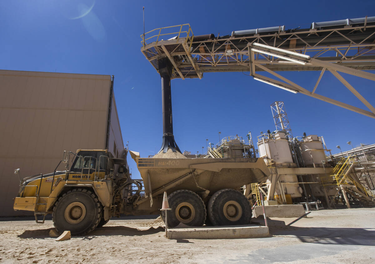 Rare earth concentrate pours onto a truck at Las Vegas-based company MP Materials on April 29, ...