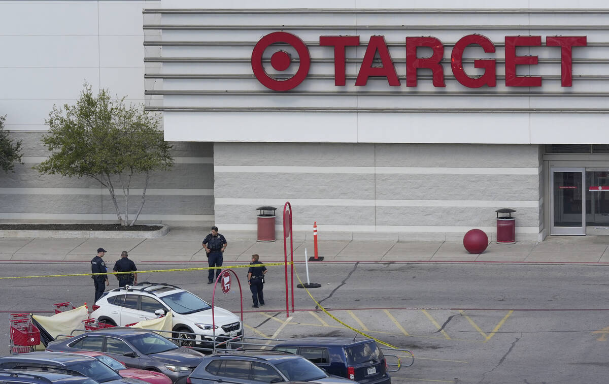 Police work at the scene of a shooting at a Target in Austin, Texas, Monday, Aug. 11, 2025. (Ja ...