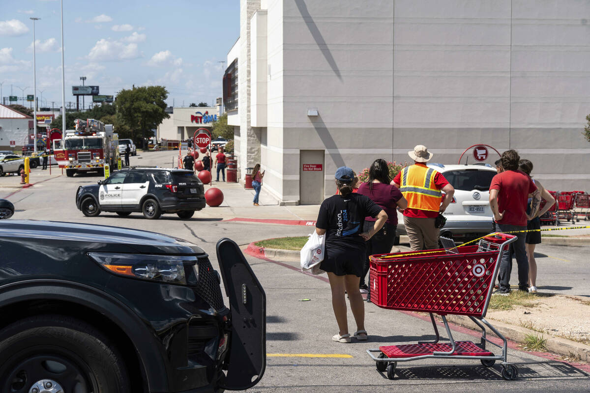 Law enforcement investigates a shooting at Target off Research Boulevard, near Ohlen Road in Au ...