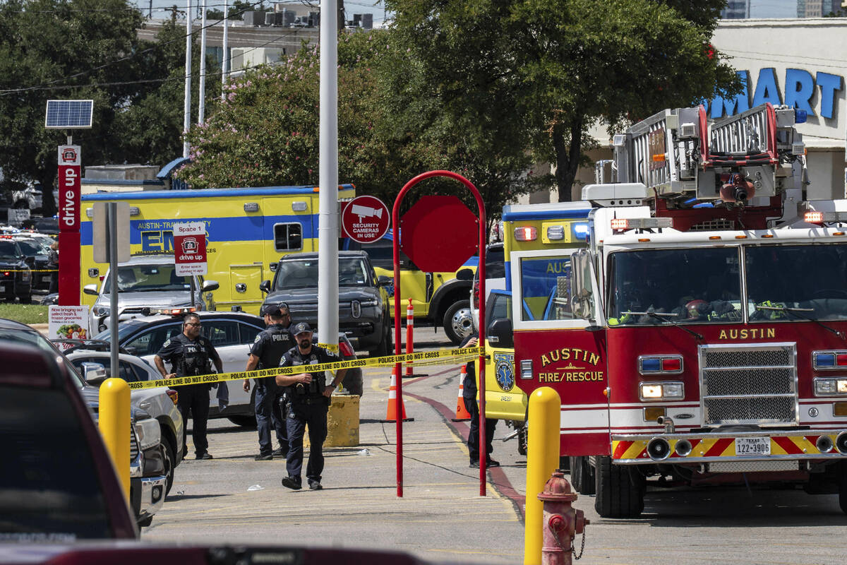 Law enforcement investigates a shooting at Target off Research Boulevard, near Ohlen Road in Au ...