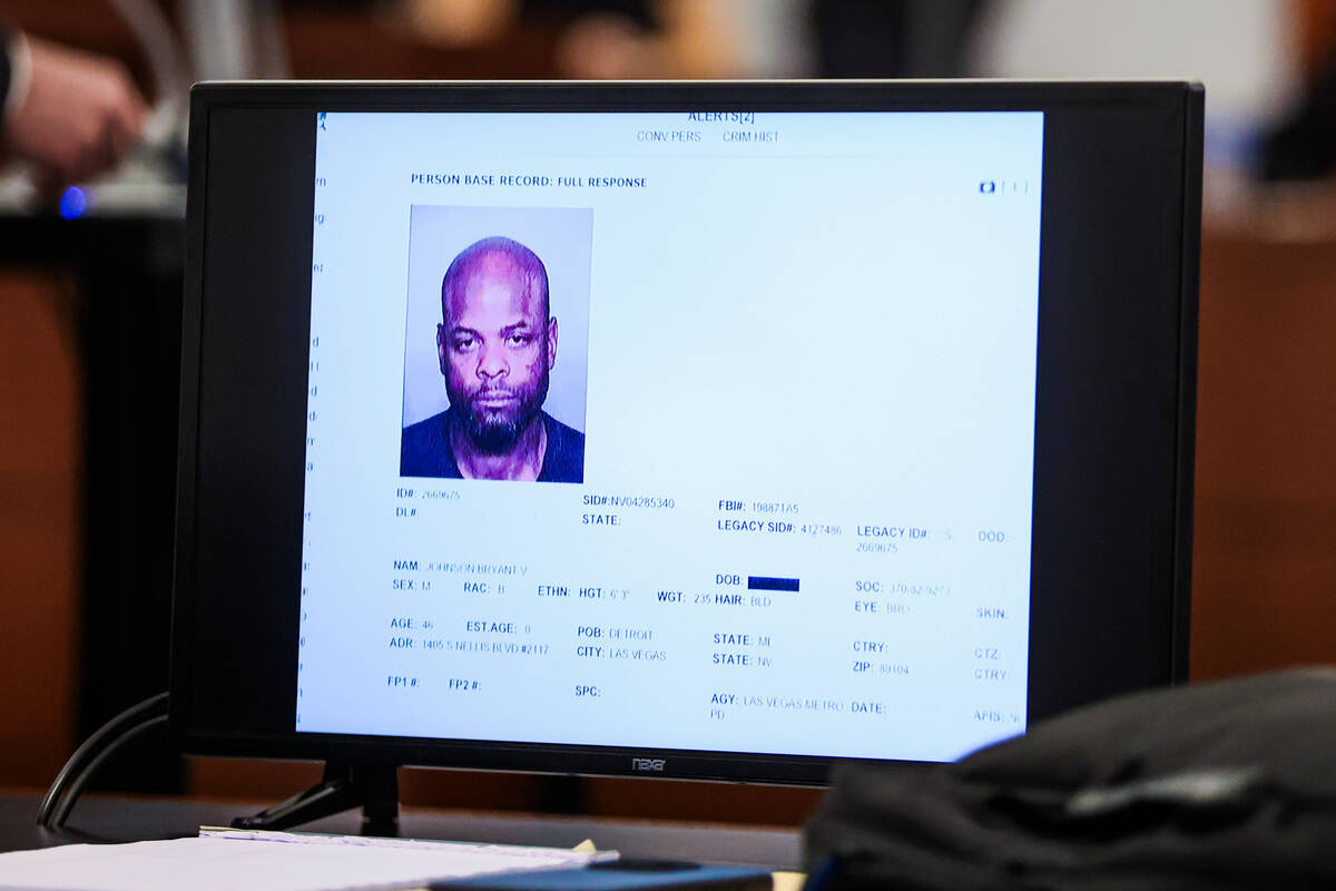 Bryant Johnson, an alleged murder victim, is shown on a screen at the Regional Justice Center M ...