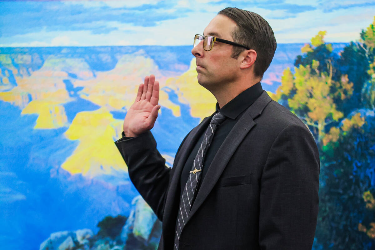 Metro detective John Hoffman is sworn in as a witness in a case against Nathan Williams at the ...