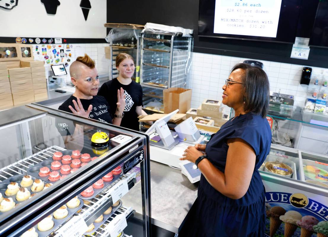 North Las Vegas mayoral candidate Daniele Monroe-Moreno, right, listens to Kari Garcia, owner o ...