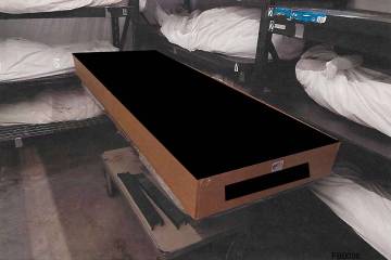 A photo exhibit in a funeral board complaint shows bodies in storage at McDermott's Funeral Hom ...
