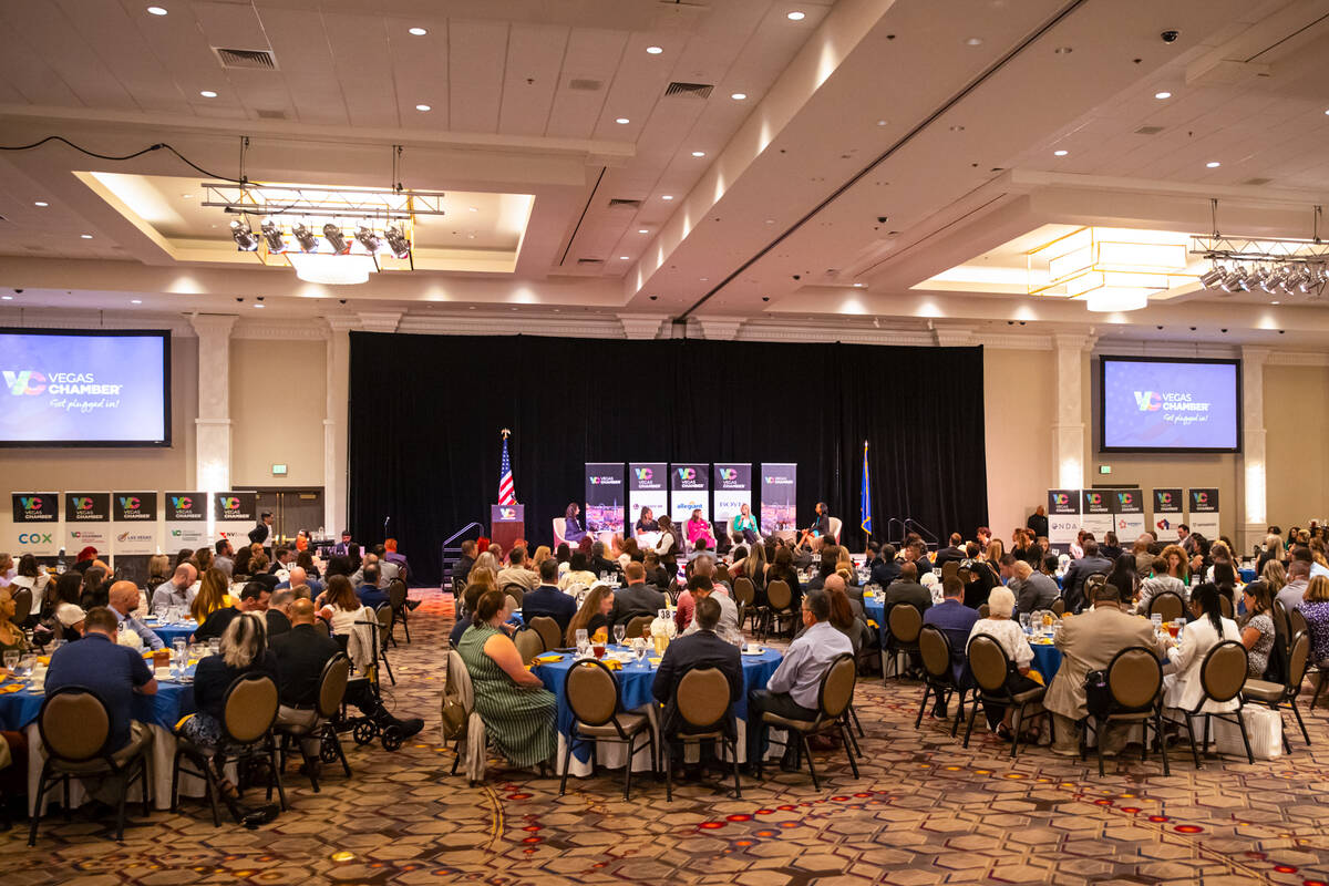 People attend a luncheon featuring a panel of speakers including Las Vegas Mayor Shelley Berkle ...