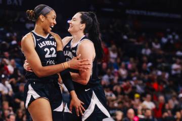 Aces center A'ja Wilson (22) and Aces center Megan Gustafson (17) giggle with each other during ...