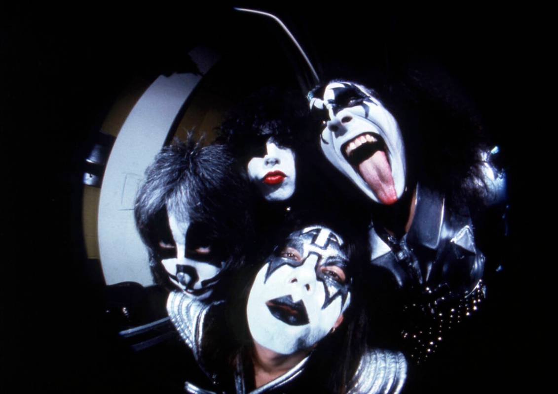 FILE - Members of the rock group KISS; Gene Simmons, clockwise from right, Ace Frehley, Peter C ...