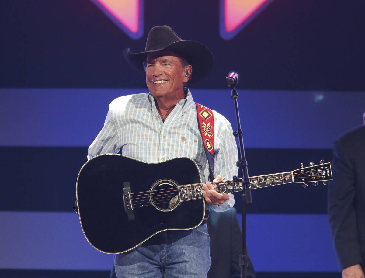 FILE - George Strait performs at the iHeartCountry Festival on Saturday, Oct. 30, 2021, at the ...