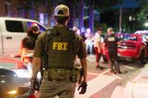 Federal law enforcement agents from various agencies including Bureau of Alcohol, Tobacco, Fire ...