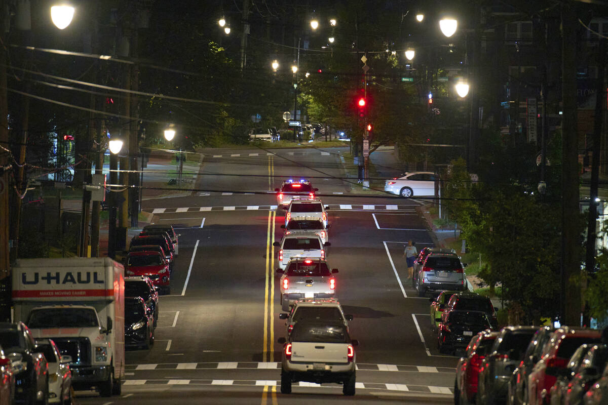 Vehicles with law enforcement agents from the U.S. Customs and Border Protection as well as Met ...