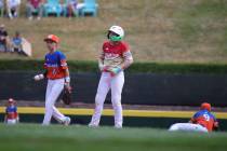 Las Vegas, Nevada's Banks Mossler celebrates a double against Clarendon Hills, Ill. in the sixt ...