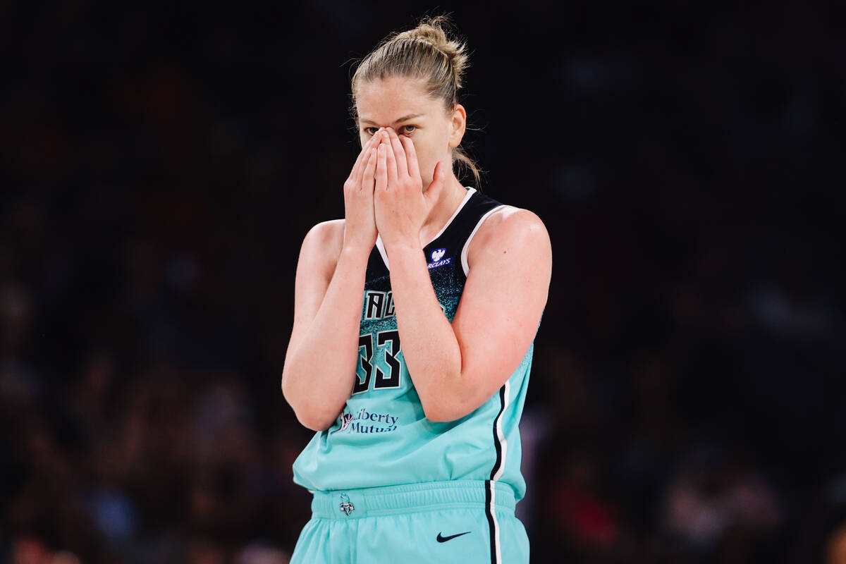 New York Liberty center Emma Meesseman (33) reacts to a teammate fouling during a WNBA basketba ...